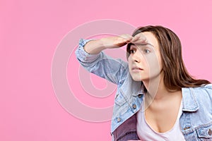 Young female adult woman isolated on pink background