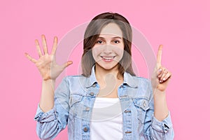 Young female adult woman isolated on pink background