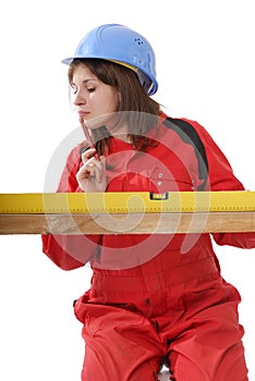 Young female apprentice in red overall photo