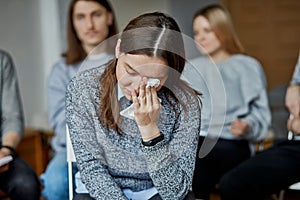 Woman cry, she is ashamed to admit that he is addicted to alcohol