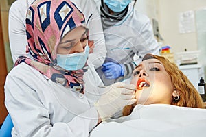 Young female asian dentist doctor