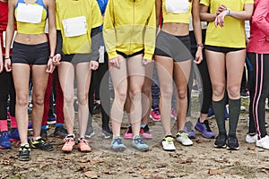 Young female atheletes ready to run. Start line. Athleticism