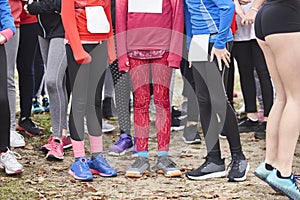 Young female atheletes ready to run. Start line. Athleticism