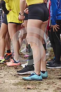 Young female atheletes ready to run. Start line. Athleticism