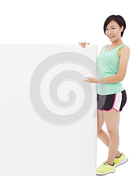 Young female athletes holding a empty board