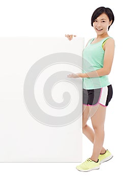 Young female athletes holding a empty board