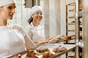 young female bakers working together