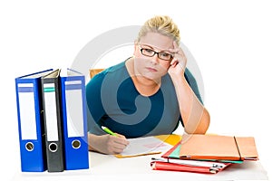 Young female businesswoman working at desk
