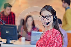 Young female in call center team