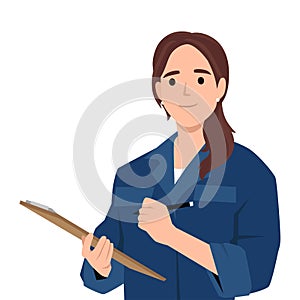 Young female construction worker checking equipment