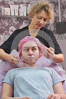 Young female at the cosmetician.