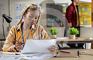 Young female creative designers working in a modern office.