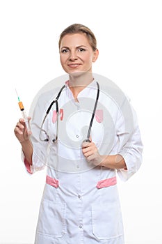 Young female doctor holding a syringe