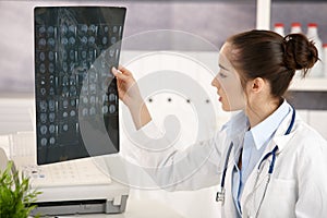 Young female doctor in office