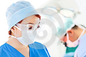 Young female doctor in operation room