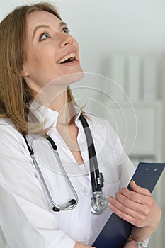 Young female doctor posing in the office