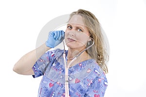 Young female doctor in scrubs