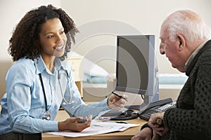 Young female Doctor with senior male patient