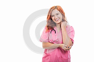 Young female doctor with stethoscope showing elbow pain gesture