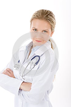 Young female doctor with stethoscope on white