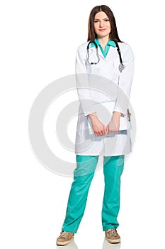 Young female doctor in uniform with clipboard and stethoscope