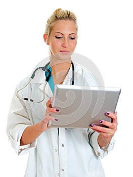 Young female doctor using tablet computer.