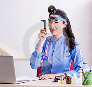 Young female doctor working in the clinic
