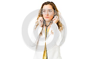 Young female doctor working with a stethoscope