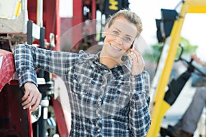 young female driver outside truck