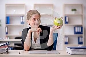 Young female employee in retirement concept