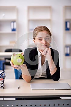 Young female employee in retirement concept