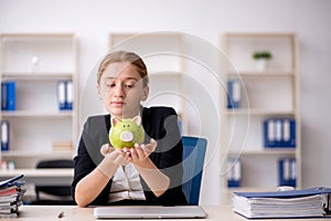 Young female employee in retirement concept