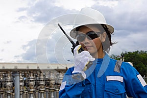 Young female engineer communicating.