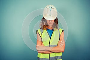 Young female engineer in high vis and hardhat