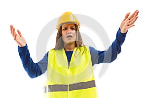 Young female engineer making angry gesture