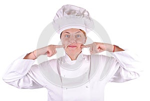 Young female executive chef point her cheek