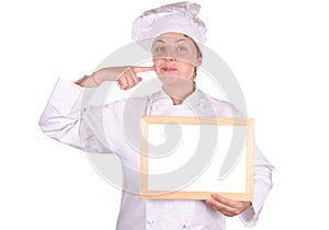 Young female executive chef showing blank menu