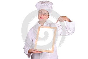 Young female executive chef showing blank menu