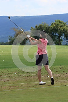 Young female golfer