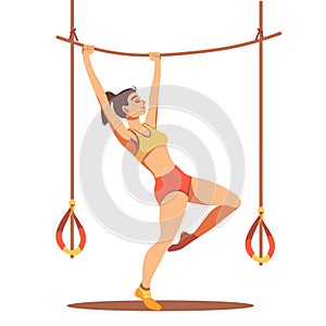 Young female gymnast performing artistic gymnastics exercise uneven bars. Athletic woman photo