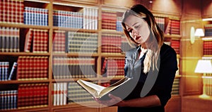 Young Female Lawyer Reading Legal Book