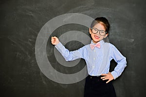 Young female little teacher using hand teaching