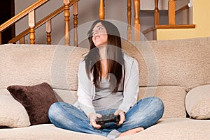 Young female lose playing video-games
