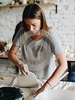 Woman Working At Pottery Studio