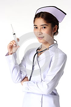 Young female nurse holding syringe