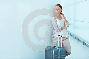 Young female passenger at the airport