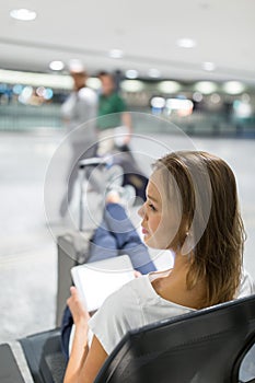 Young female passenger at the airport