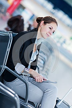Young female passenger at the airport,