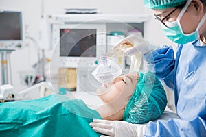 Young female patient receiving artificial ventilation photo