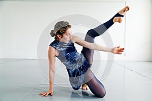 Young female performer practicing contemporary dance